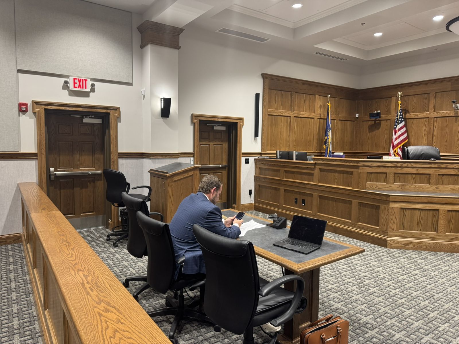 A Kentucky circuit courtroom, counsel table in the foreground