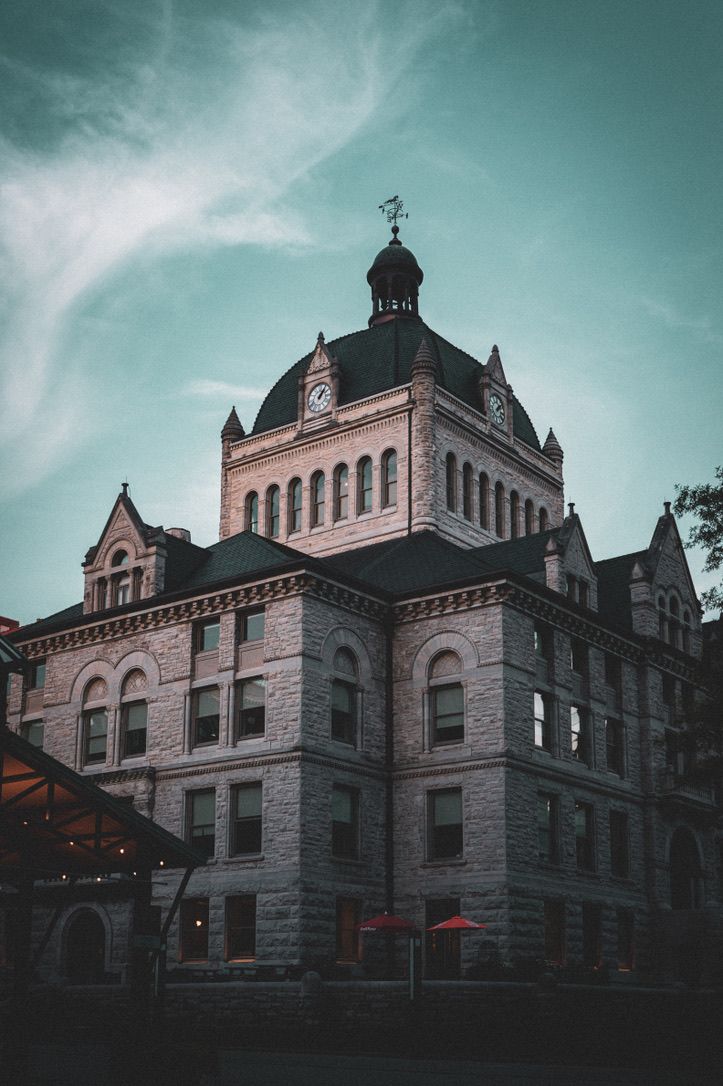 The historic Fayette County Courthouse dome against an evening sky