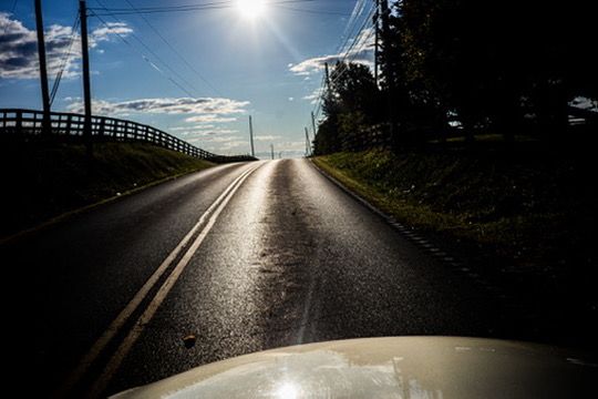 A Kentucky back road rising toward the sun